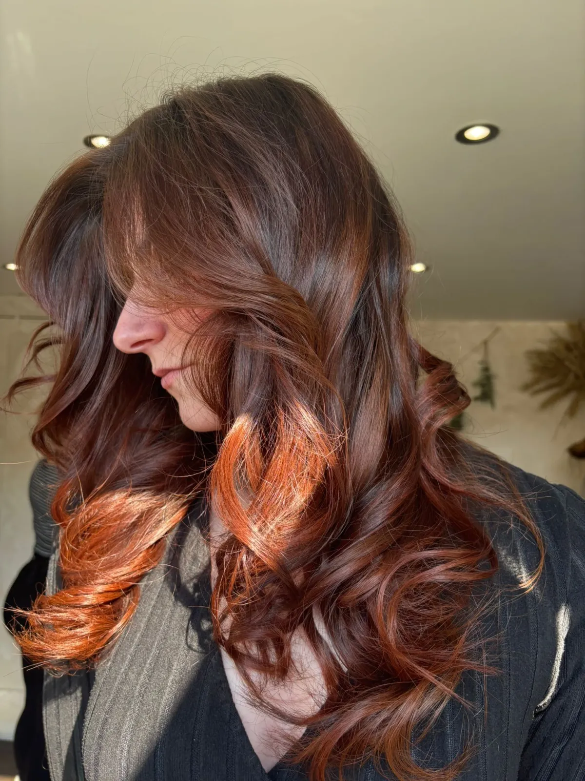 Full colour transformation result at MNR Hair — rich auburn tones