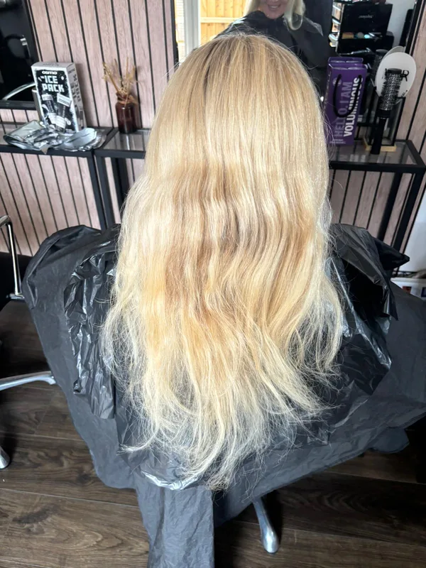 Before: Brassy damaged blonde hair requiring professional colour correction service Gloucester