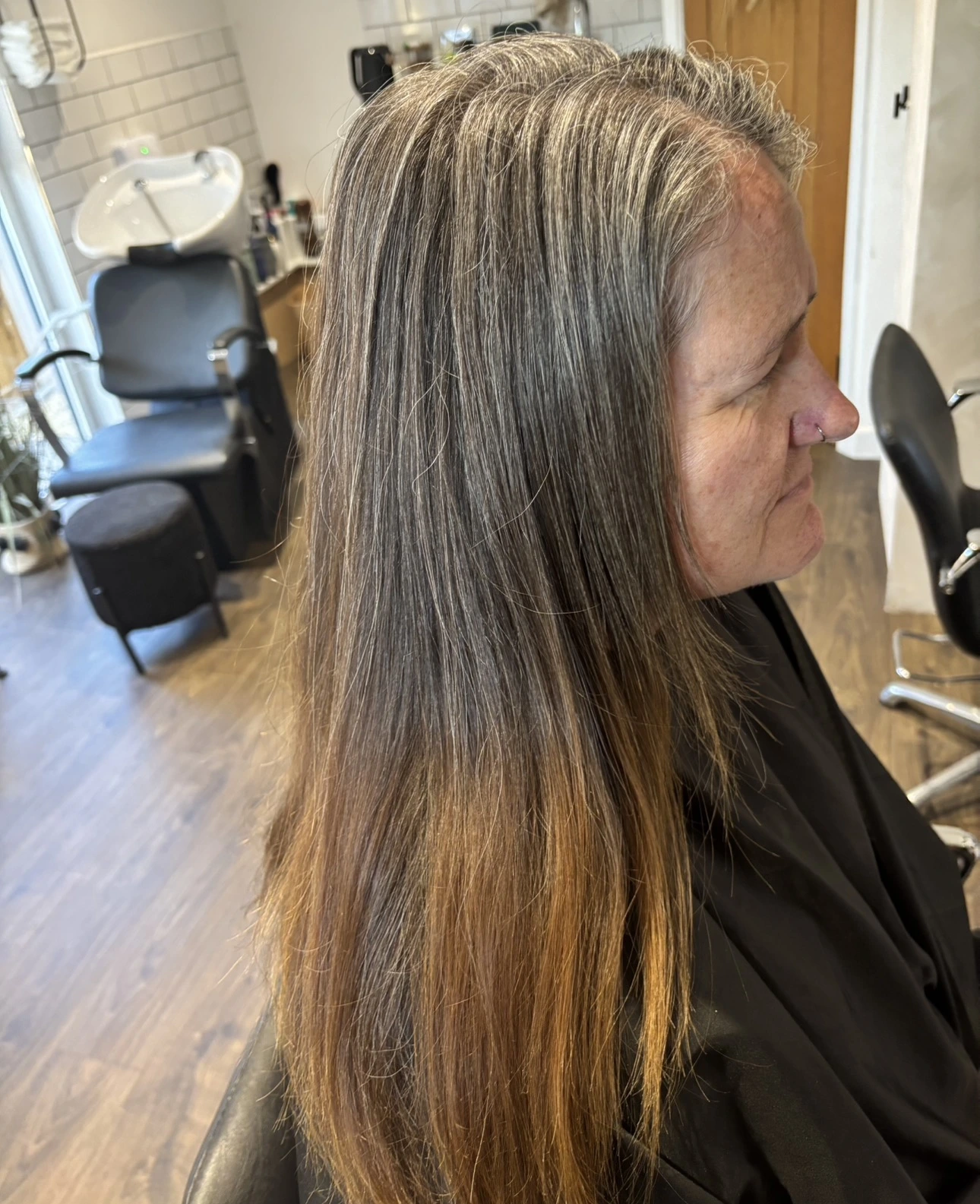 Before specialist grey blending with visible warm colour through the lengths