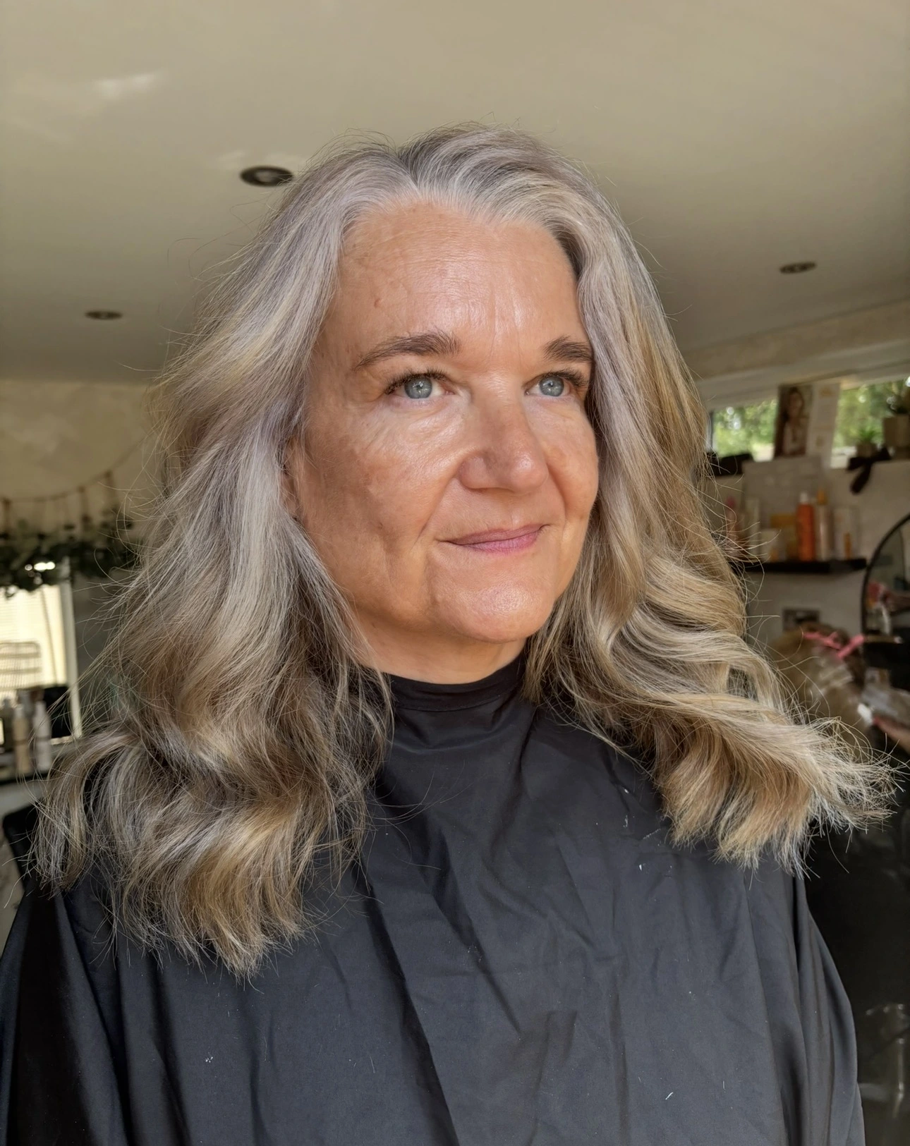 After grey blending with soft, dimensional silver-blonde waves