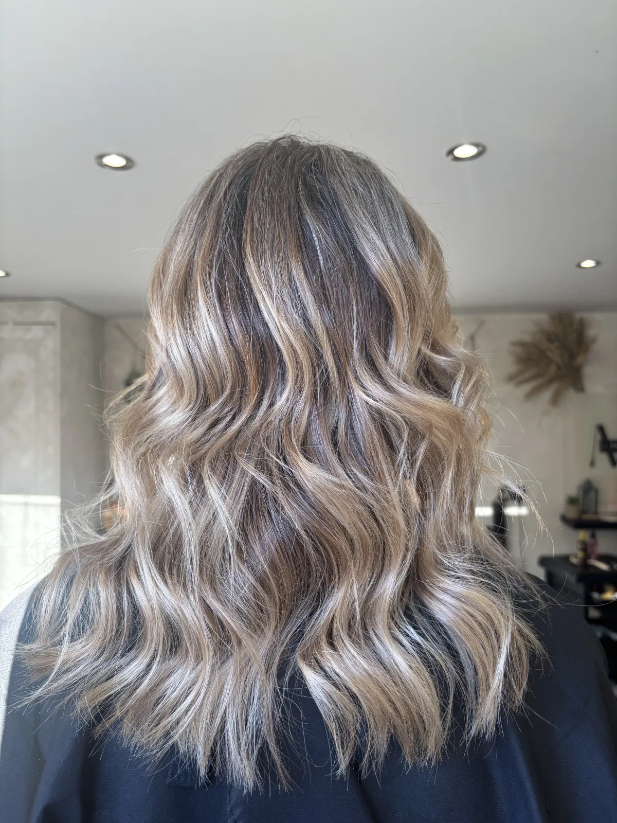 Lived-in blonde balayage result at MNR Hair
